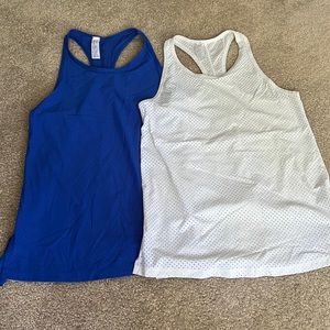 Two Spanx tanks size xs